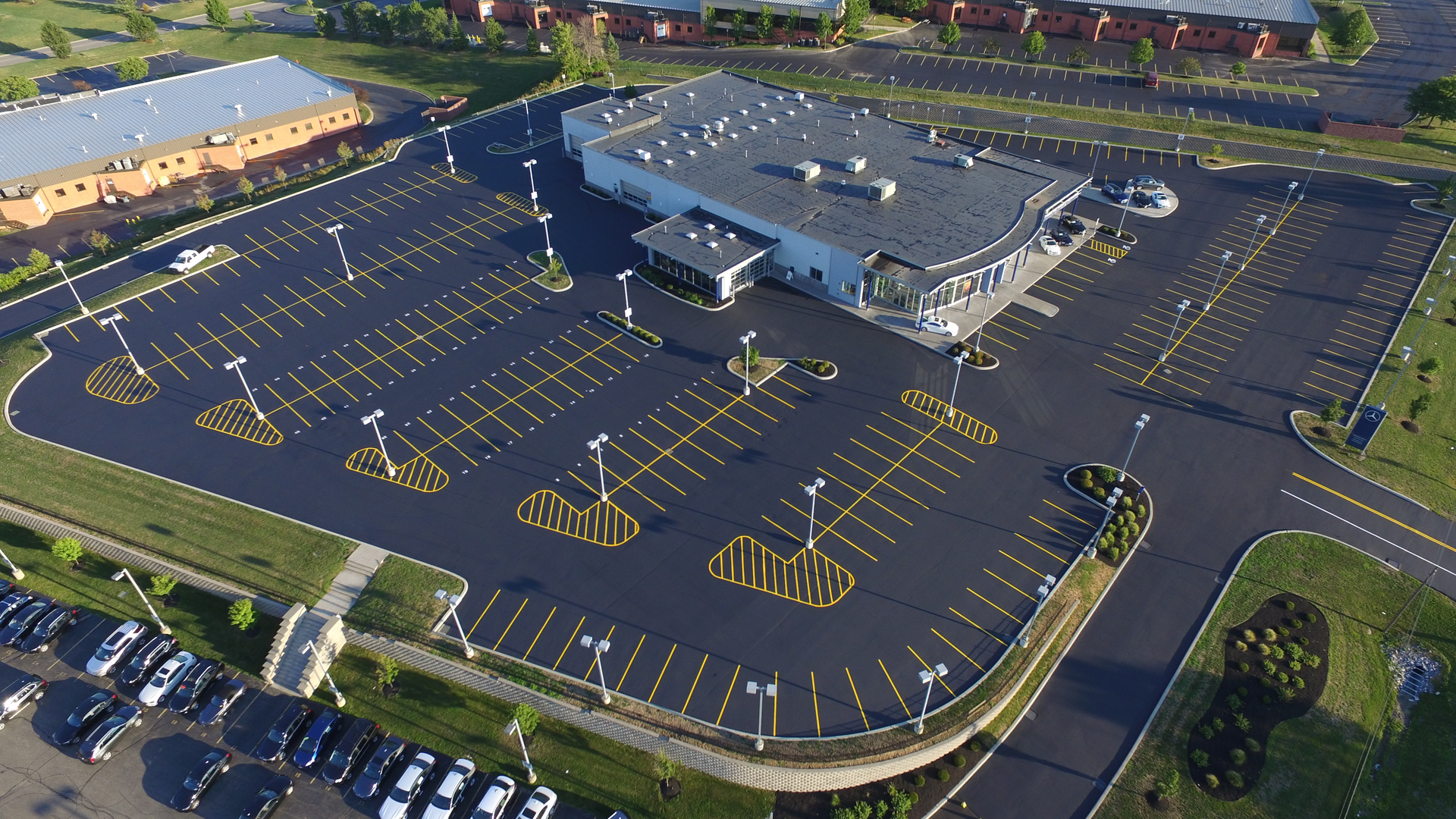 Five days a week the sealcoating crews work on both residential and commercial properties, doing commercial work in the morning and residential work in the afternoon. The other two days Magic Seal does only residential sealcoating.
