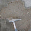 Surface delaminations are separations of the top surface from the underlying concrete.