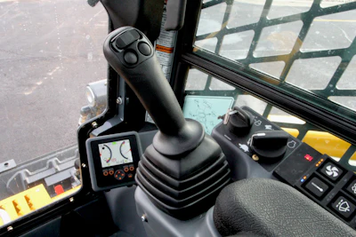 Today's compact machines, such as this Gehl skid steer, feature electric hydraulic proportional controls that allow operators to maintain precise control of attachments and allow instantaneous ramp-up to full flow — all at the touch of a button on the joystick.
