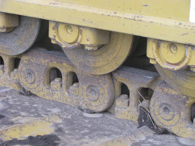 When a track’s components are wearing down faster than anticipated, most of the time it is due to improper track selection, or inexperienced operators running in high-speed reverse, digging the machine down in sandy or rocky mud or trenching under high load in material that wears at the metal.