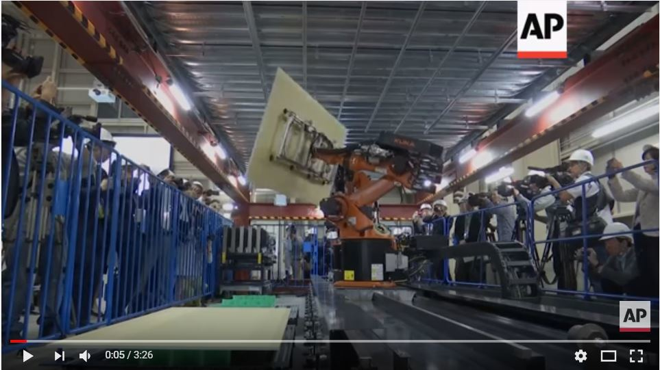 Shimizu Corp., one of Japan’s largest general contractors, shifted trials of autonomous construction robots such as this roofing and flooring machine into high gear, and expects to have it working on a construction site in fall 2018.