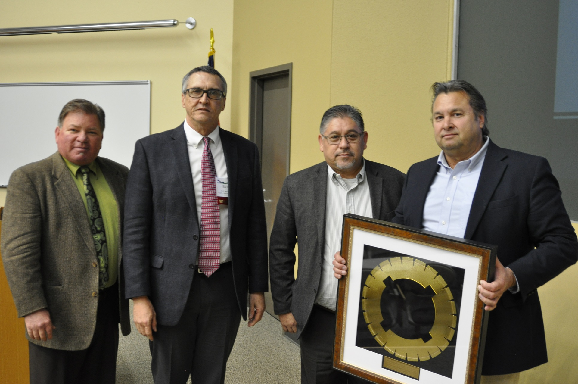 Employees of the Texas Department of Transportation – Houston District were selected as this year’s winners of the national award. From left to right: John Roberts, executive director of the International Grooving & Grinding Association; Bill Brudnick – Director of transportation planning and development (Houston District TxDOT); Mark Woolridge- – Director of Maintenance (TxDOT- Houston District); and Lucio Ortiz- – Director of Construction (TxDOT- Houston District)
