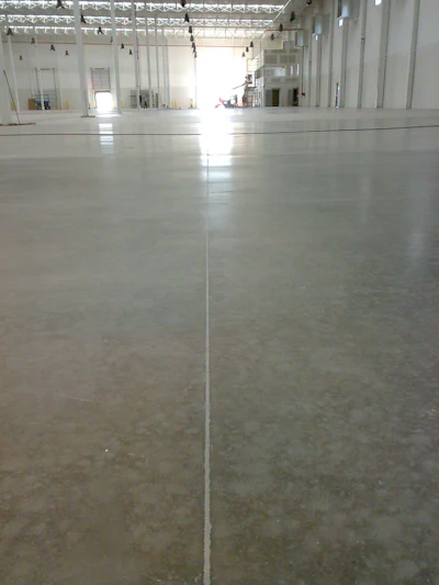 After the application pictured here is what a control joint on warehouse floor should look like.