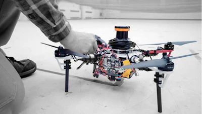 MIT researchers successfully tested a system of using self-navigating, object avoiding drones for mapping in GPS deprived locations using laser rangefinders and pattern recognition software to find their way.