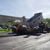 Approximately 18 crew members were directly involved in the project, including ten on the paving crew, five on the milling crew, and four doing the striping.