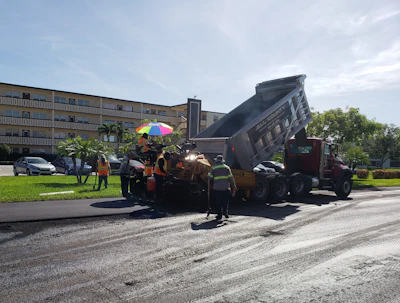 Approximately 18 crew members were directly involved in the project, including ten on the paving crew, five on the milling crew, and four doing the striping.