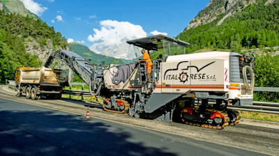 Thanks to the 7-ft. milling width, Wirtgen's W 220 was able to mill off the surface course across the full width of the roadway in just two tracks on most sections of the highway.