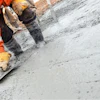When slabs are placed on problematic subbases with risks of non-uniform support or consist of moderate to high shrinkage concrete or joint spacings exceed 15 ft., then reinforcement is necessary to limit widths of cracks should they occur.