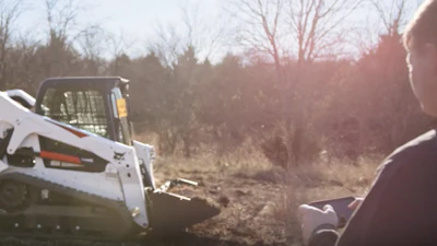 Using an app Bobcat's MaxControl turns an operator’s smartphone into a control unit for the loader with the ability to command machine functions and operate attachments from up to 300 ft. away.