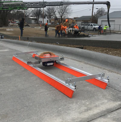 Marion's handleless concrete finishing system is pulled from side to side with ropes eliminating excessive handle weight.