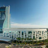 The curves created by the hotel's guitar shape required an advanced design for the sloped columns that now give the guitar its iconic silhouette.