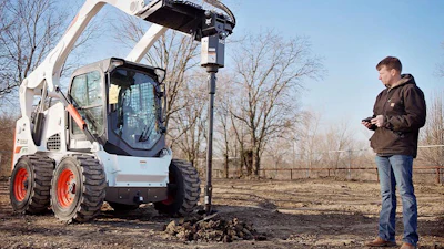 Bobcat Maxcontrol remote control post-hole digging