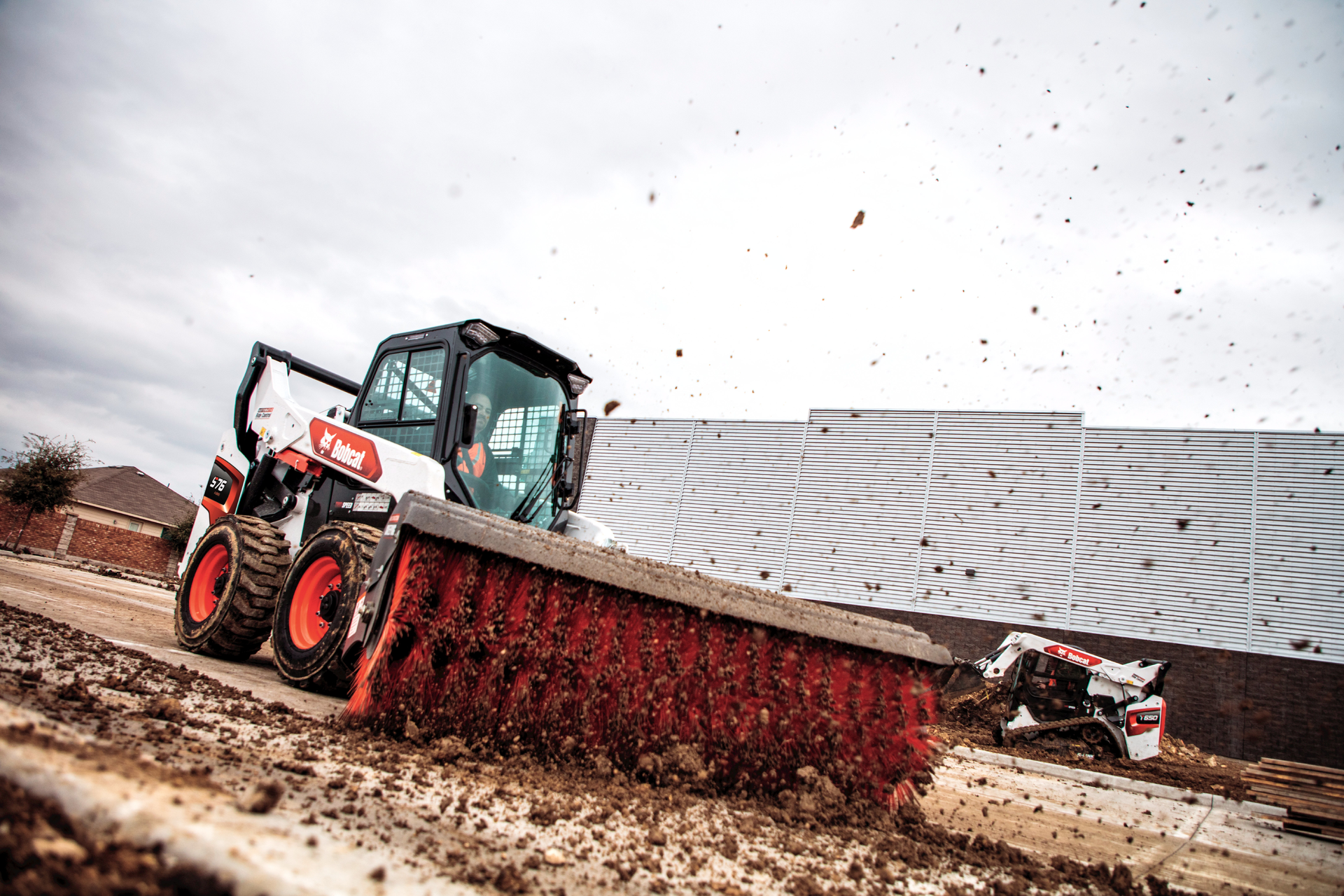 Bobcat S76 skid steer with angle broom