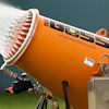 Specialized nozzles create a mist that’s propelled by a powerful industrial fan.