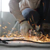 Person Holding Grinder 1216544