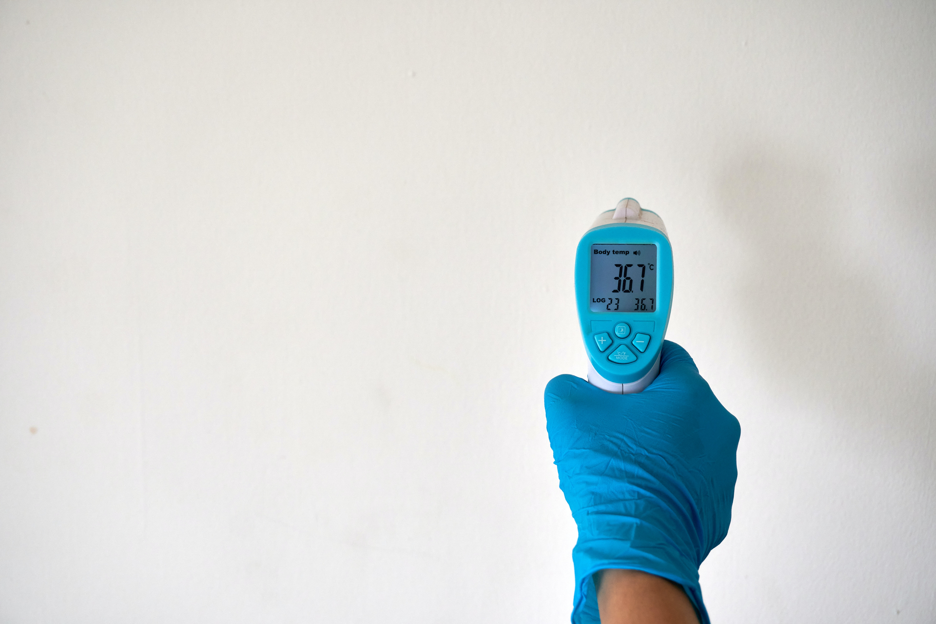 Person Wearing A Rubber Glove 4021186