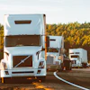 White Volvo Semi Truck On Side Of Road 2199293 (1)