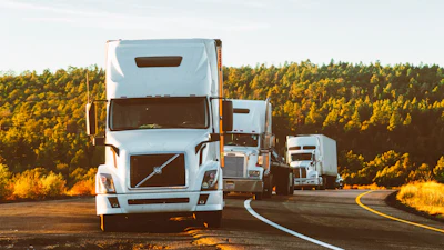 White Volvo Semi Truck On Side Of Road 2199293 (1)