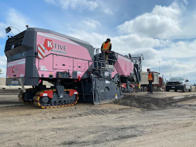 The new F-Series Wirtgen mills include the option to add a customizable wrap around the machine. While most companies utilize this to add a logo or company colors, K-Five Construction’s shop manager, Dave Gorski, came to them with the idea for a pink wrap as a way to promote cancer awareness.