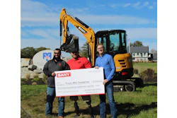 SANY America presented a check and an SY35U excavator to The Travis Mills Foundation at their facility in Rome, ME. From left to right: Joe Duplessis, Northeast District sales manager for SANY America; Travis Mills, founder of The Travis Mills Foundation; and Ben Miller, vice president of sales for construction equipment, SANY America