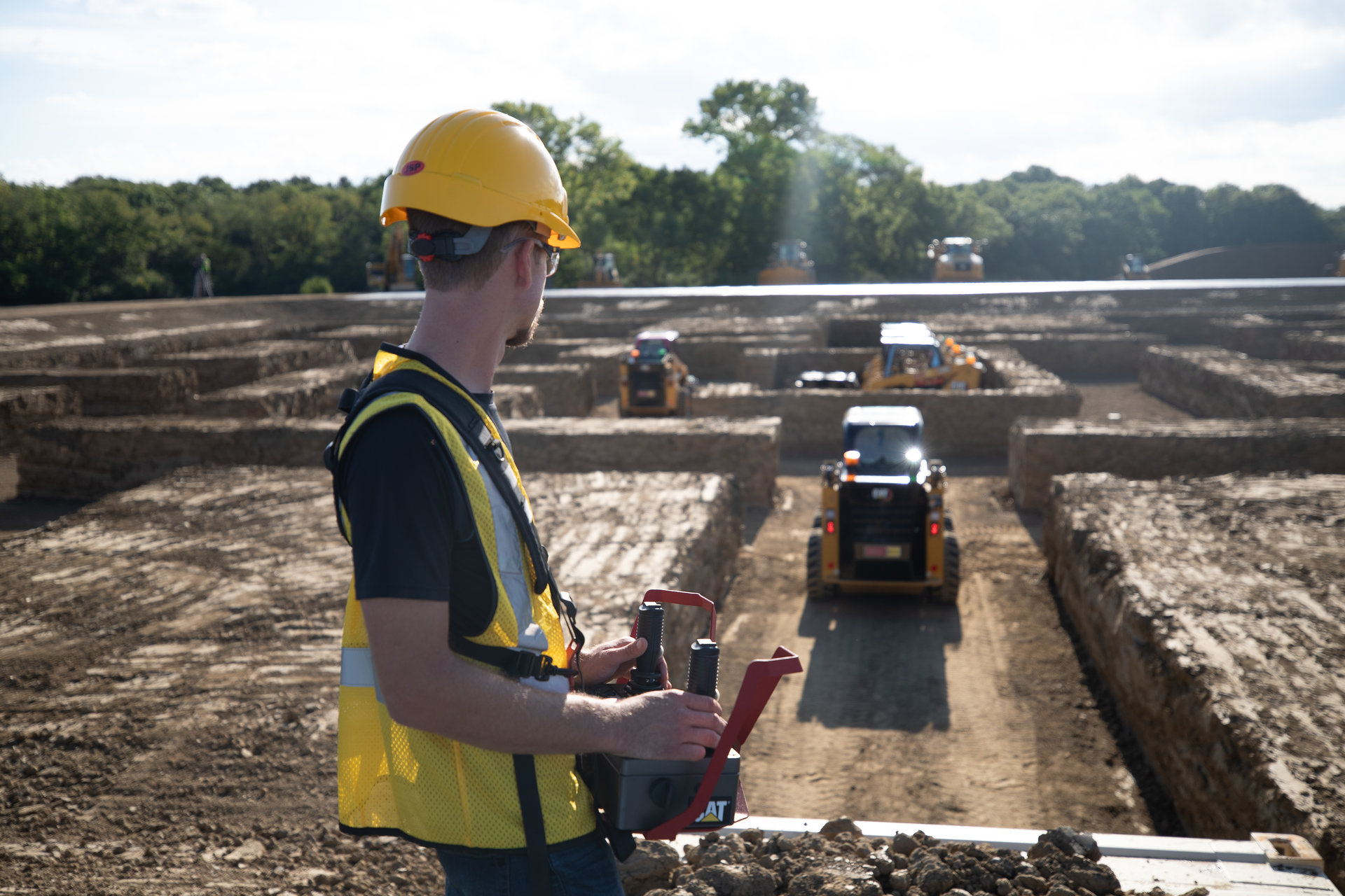 During the video, five players race their machines around an exact 3D replica of the iconic PAC-MAN™ board to simulate gameplay of the original arcade game. The movement is all done through remote control operation far above the constructed maze, utilizing 236D3 skid steer loaders from The Cat Rental Store.