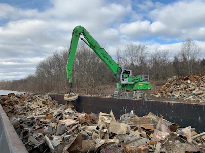 Adamo Group uses its Sennebogen material handlers with a magnet to pull rebar and other ferrous scrap from the piles of rubble, reducing landfilled material and adding an additional revenue stream.