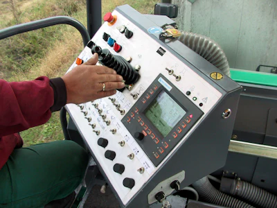 Paver control systems have come a long way over the past decade. Shown is a past generation operating concept on a Vogele asphalt paver.