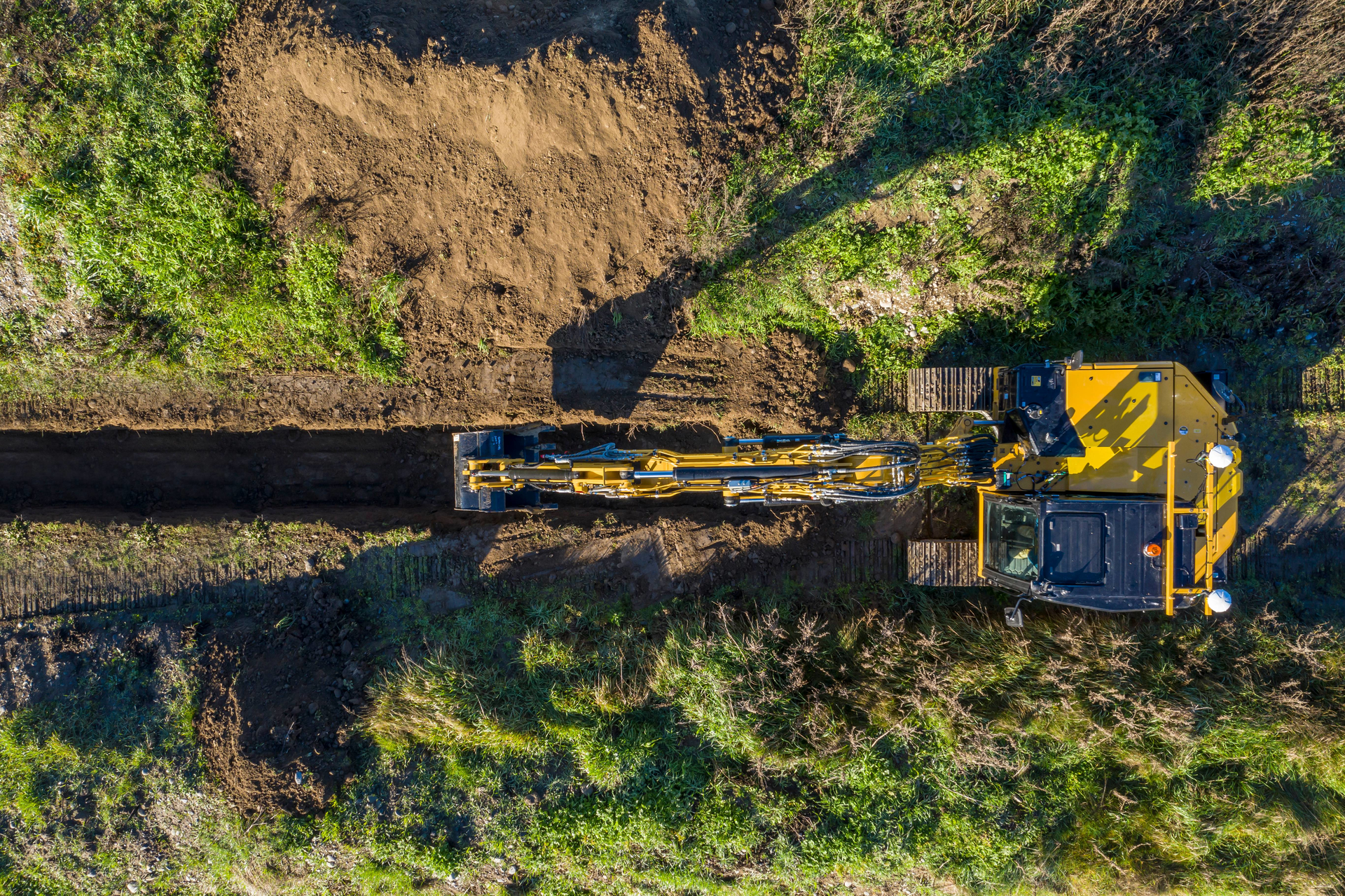 Semi-autonomous functions can simplify many complex operations, such as trenching with an excavator.