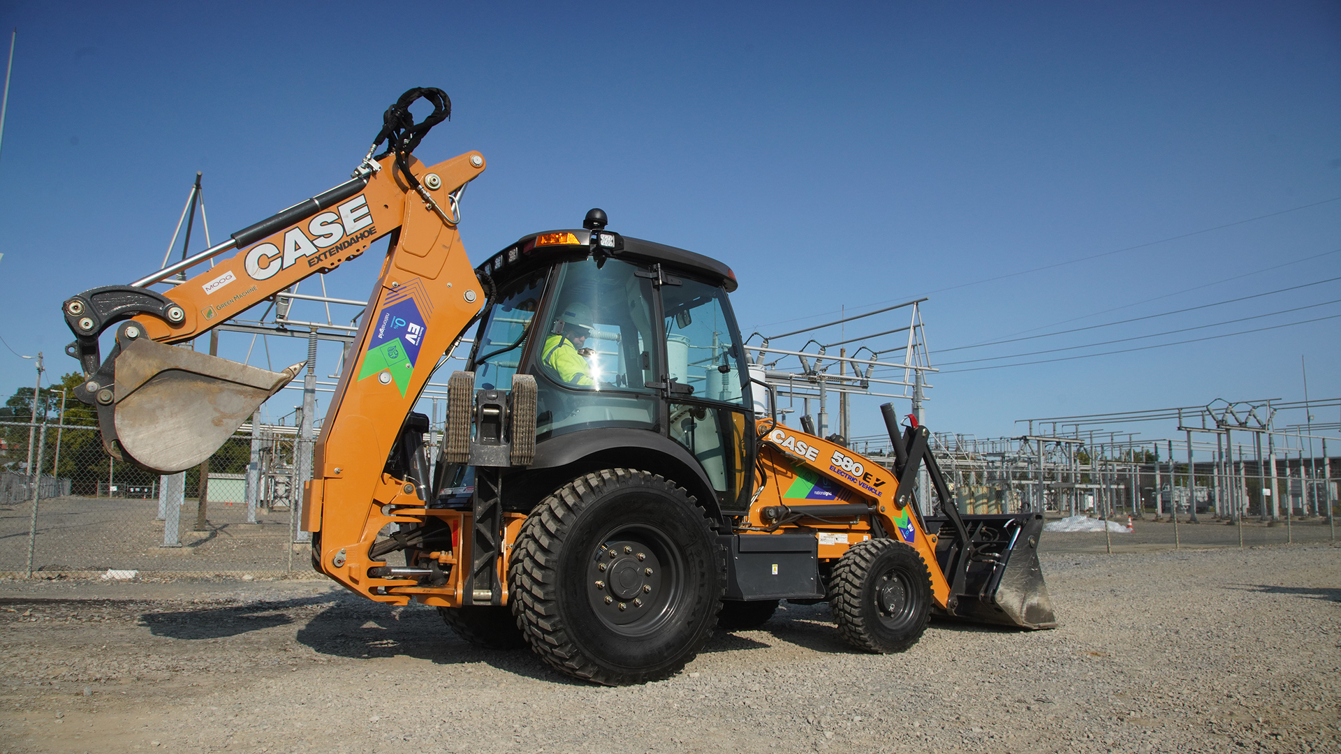 National Grid utilizing its CASE 580 EV backhoe-loader.