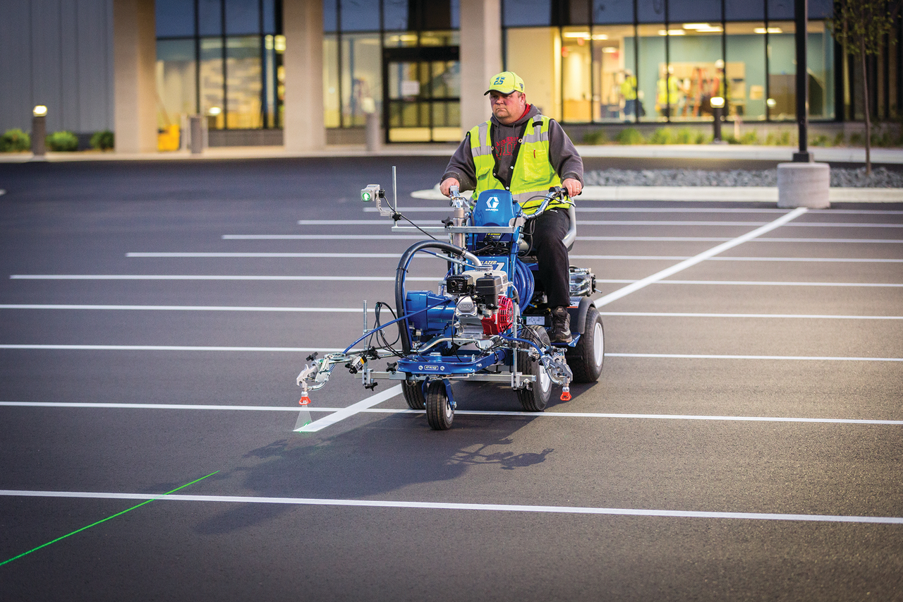 Stripers such as this Graco LineLazer 3900 V, feature auto-layout, which eliminates measuring and chalking of a parking lot.