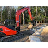 Marlboro Mountain Construction is uses a Werk-Brau Power Grip Bucket and Engcon Tiltrotator to easily grip and move rock and other materials.