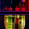 Oil viscosity is being tested in a lubricant lab.