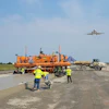 Atlantic Contracting and Material Co. Inc. were hired to pave both the Dulles International and Andrews Airforce Base at the same time. Causing them to purchase a fourth RexCon Model S concrete plant. They used a Guntert & Zimmerman S850 Quadra Bolster Concrete Slipform Paver.