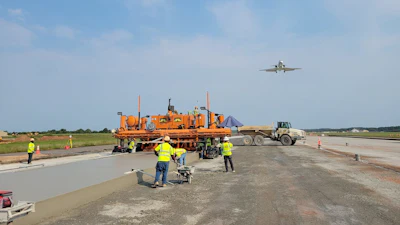 Atlantic Contracting and Material Co. Inc. were hired to pave both the Dulles International and Andrews Airforce Base at the same time. Causing them to purchase a fourth RexCon Model S concrete plant. They used a Guntert & Zimmerman S850 Quadra Bolster Concrete Slipform Paver.