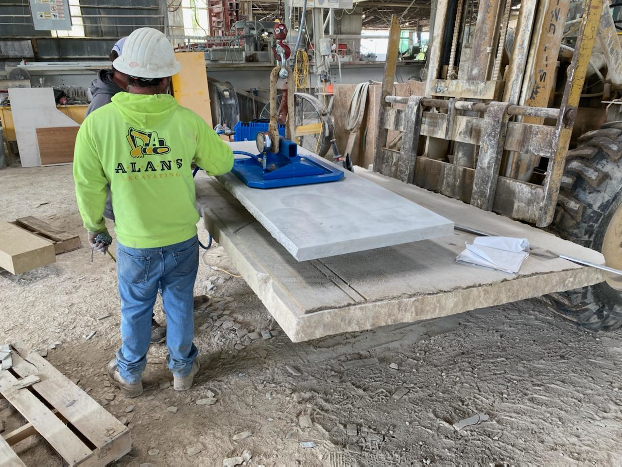 Silverdale Quality Stone coupled a Vacuworx PHD vertical lift mounting assembly with a Caterpillar 262D skid steer loader, using the system to maneuver 1,500-lb limestone slabs in the vertical position