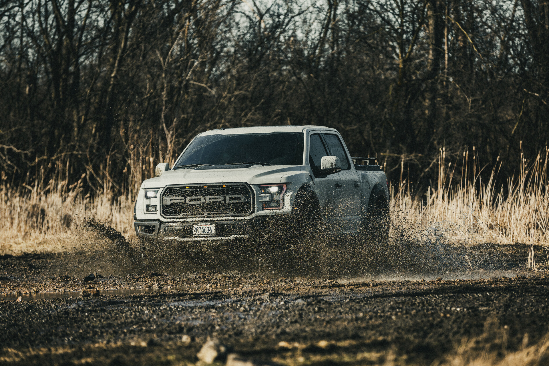 Some benefits offered by a lifted truck equipped with larger tires include increased visibility, along with needed ground clearance, both of which reduce risk of damage to the undercarriage.