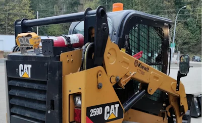 A Caterpillar 259D track loader with the Blaxtair pedestrian detection system installed. The stereo camera, combined with advanced machine learning algorithms, can sense people in the machine's path and either alert the operator or slow and stop the machine.