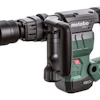 The SDS-Max MHE 5 Chipping Hammer includes the tool, a 360-degree D-handle, bit lubrication and a wiper, packaged in a heavy-duty plastic case.