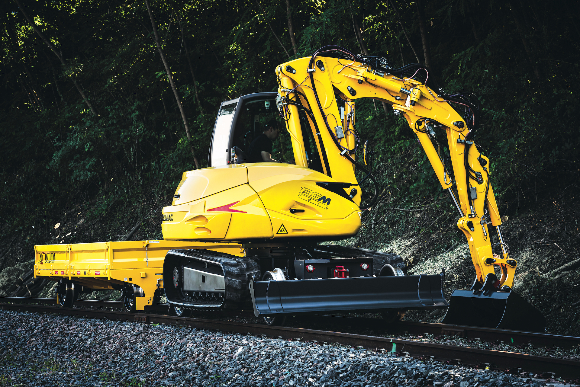 Designed for light to medium service, confined work areas, Class 1 railroads and maintenance jobs, the 136MRail is a multi-function machine serving as an excavator, loader and material handler during operations.