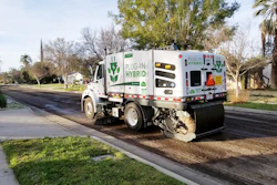 Hybrid Broom Bear In Use Street Left Facing