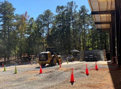 The Caterpillar Global Operator Challenge in Clayton, N.C., had a wheel loader portion that required competitors to cart around a 1980s-era Cat yellow Chevy Blazer.