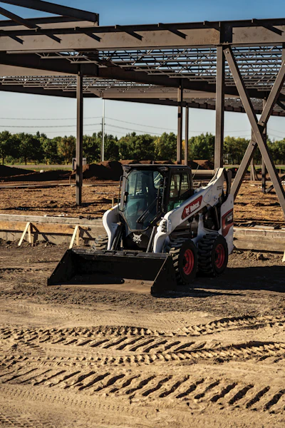 Two-speed travel can save operators time in moving material across a jobsite and move between jobsites.