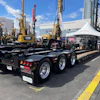 The custom trailer maintains a 70-ton rating at half the deck length and offers 6-in. loaded road clearance.