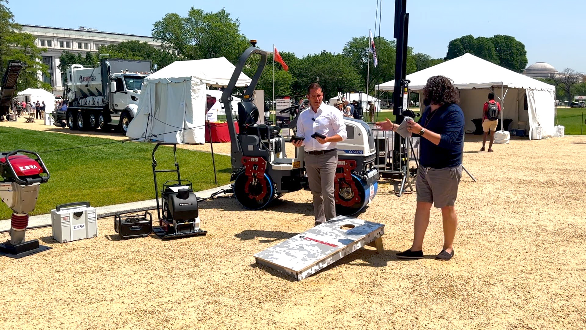 Jamie Roush (President, Dynapac NA) and Brandon Noel (Editor, Asphalt Contractor) play a little cornhole and talk brand strategy on the National Mall.