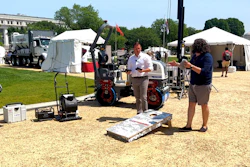 Jamie Roush (President, Dynapac NA) and Brandon Noel (Editor, Asphalt Contractor) play a little cornhole and talk brand strategy on the National Mall.