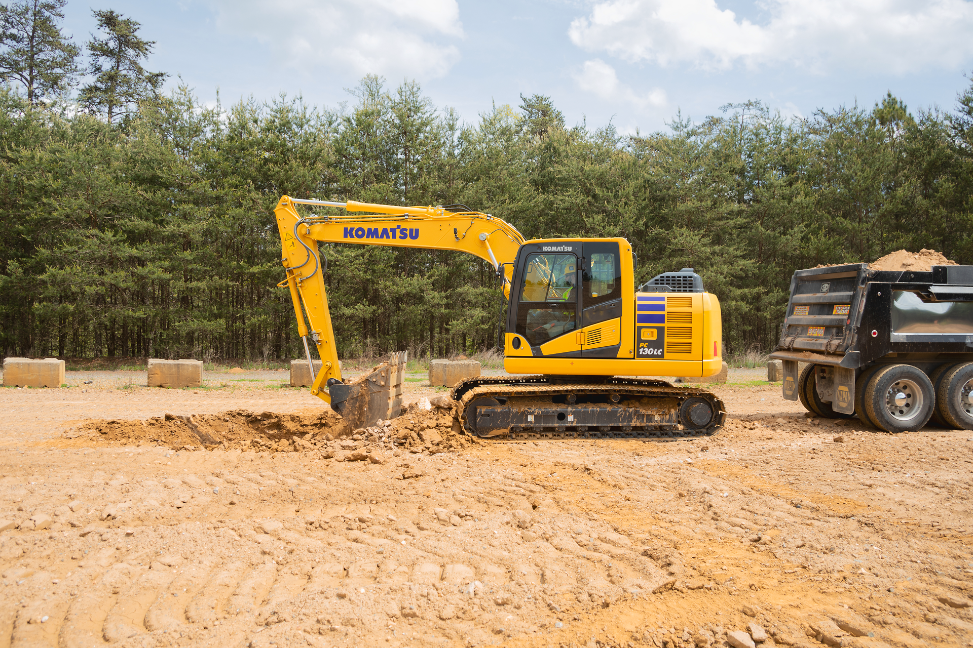The 97.2-hp tail swing excavator features increased lifting capacity by up to 20% compared to the previous model.