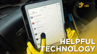 Operator Using An Ipad To Help Identify Machines For Maintenance