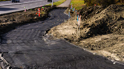 Recycled materials such as recycled concrete and asphalt can be used as base materials, reducing waste and lowering costs while maintaining the same structural integrity as traditional materials.