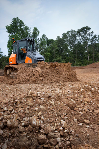 The DEVELON DD130 dozer offers two blade sizes: a standard 4.6 cubic yard blade or an optional 5.5 cubic yard capacity blade.