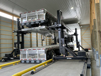The stacking system requires just one person to operate without the need for special rigging, slings or climbing onto the trailers.